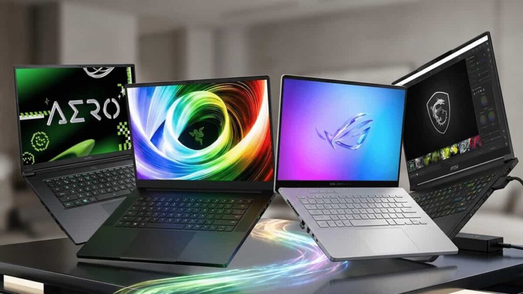 Premium creator laptops comparison featuring GIGABYTE AERO X16, Razer Blade 16, ASUS ROG Zephyrus G16, and MSI Stealth 16 on a desk.